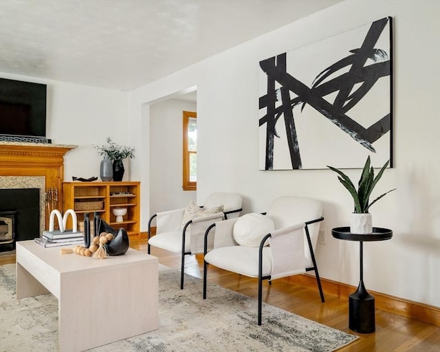 51 Burget Ave, Medford, MA 02155 - living area featuring light wood-type flooring and baseboards