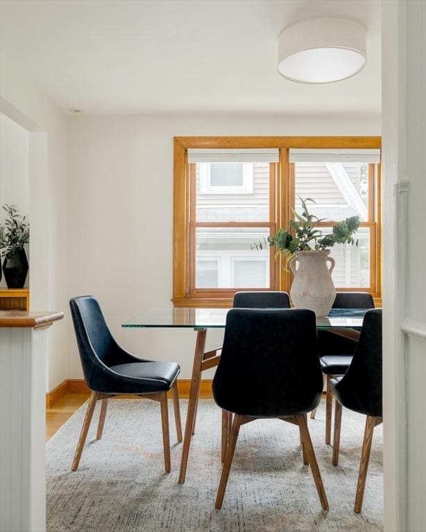 51 Burget Ave, Medford, MA 02155 - dining space featuring plenty of natural light and wood finished floors