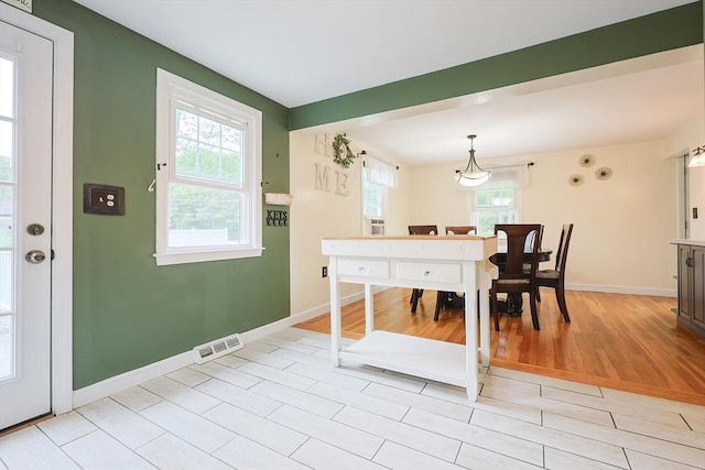 57 Hawes St, Wrentham, MA 02093 - dining space with light wood-type flooring and baseboards