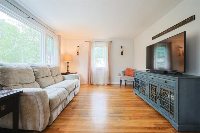 57 Hawes St, Wrentham, MA 02093 - living area with light wood-style floors and baseboards