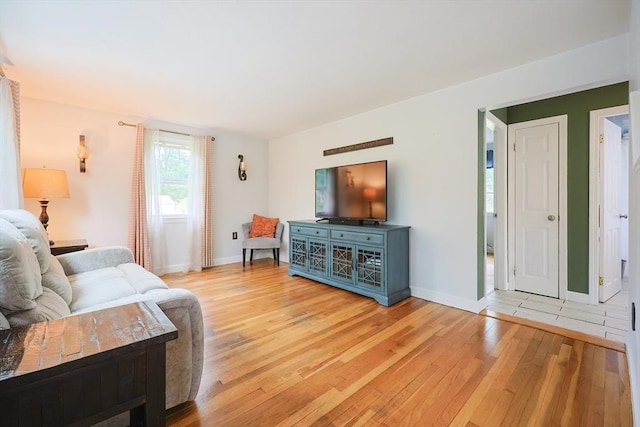 57 Hawes St, Wrentham, MA 02093 - living area with light wood-type flooring and baseboards