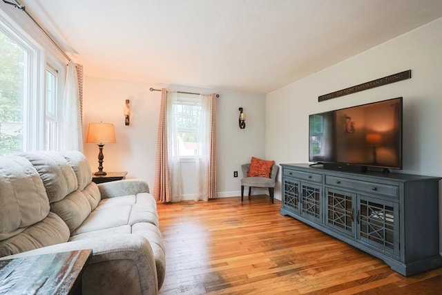 57 Hawes St, Wrentham, MA 02093 - living room with light wood finished floors and baseboards