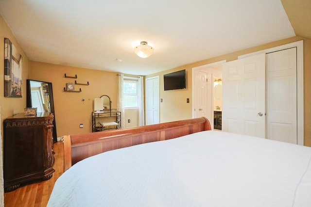 57 Hawes St, Wrentham, MA 02093 - bedroom with wood finished floors and ensuite bathroom