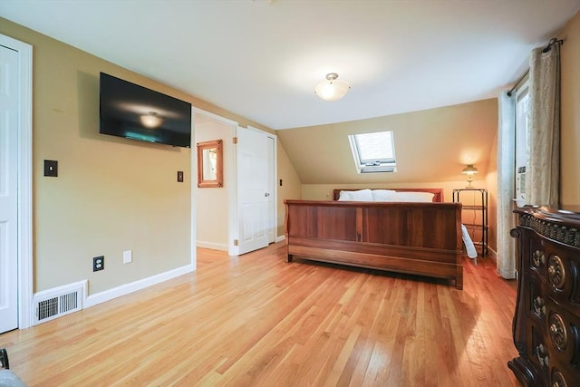 57 Hawes St, Wrentham, MA 02093 - bedroom with a skylight, light wood-type flooring, and vaulted ceiling