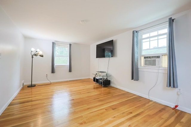 57 Hawes St, Wrentham, MA 02093 - unfurnished living room featuring light wood-style floors and cooling unit
