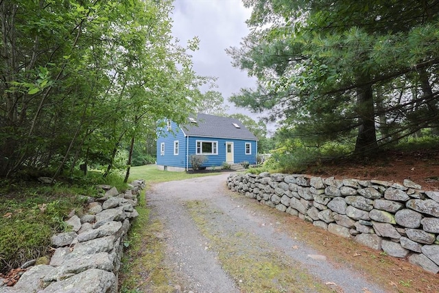 57 Hawes St, Wrentham, MA 02093 - view of front of house with dirt driveway