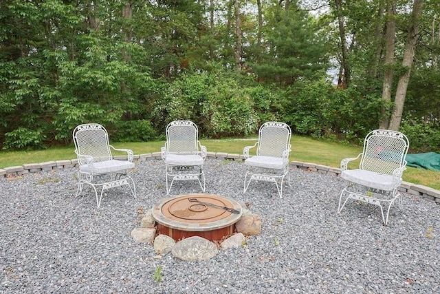 57 Hawes St, Wrentham, MA 02093 - view of patio / terrace featuring an outdoor fire pit