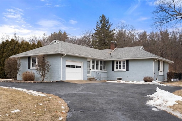 view of side of property with a garage