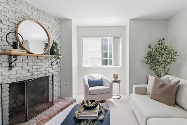 87 E Bluff Rd Unit 87, Ashland, MA 01721 - carpeted living room featuring a fireplace and baseboards