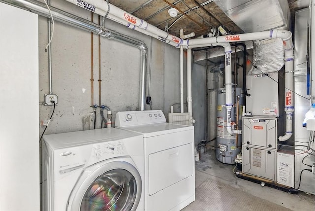 87 E Bluff Rd Unit 87, Ashland, MA 01721 - laundry room with gas water heater and washing machine and dryer