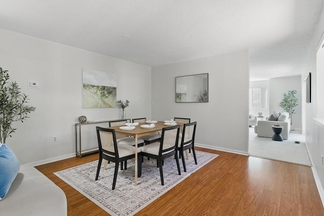 87 E Bluff Rd Unit 87, Ashland, MA 01721 - dining area featuring wood finished floors and baseboards