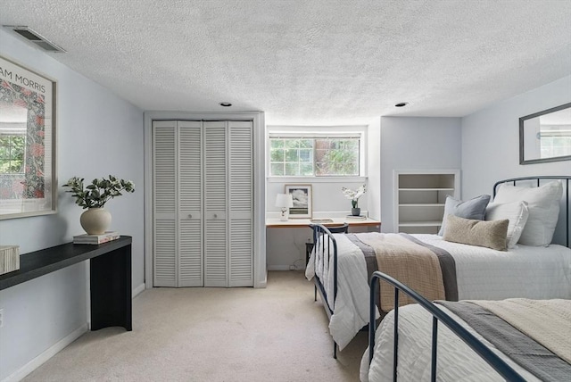 87 E Bluff Rd Unit 87, Ashland, MA 01721 - bedroom with light carpet and a textured ceiling