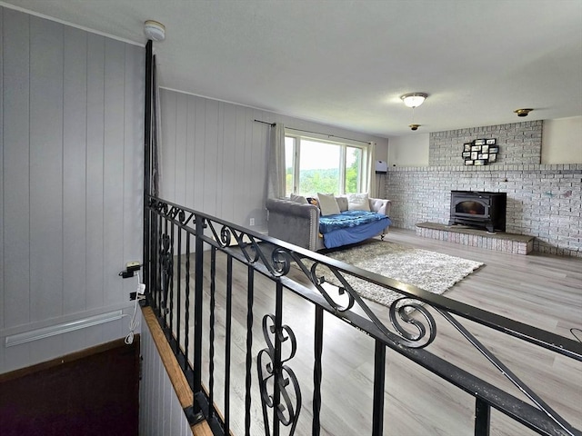 3 Main St, Spencer, MA 01562 - living area featuring a wood stove and wood finished floors