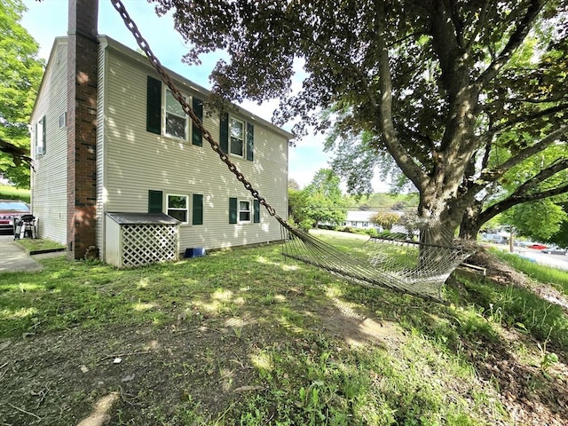 3 Main St, Spencer, MA 01562 - view of home's exterior with a chimney
