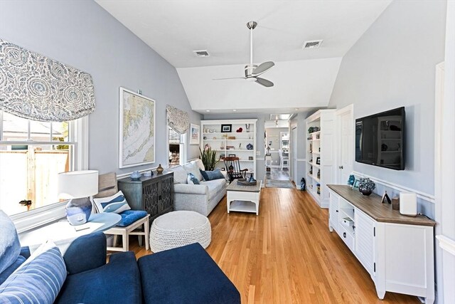 24 Park St, Bourne, MA 02559 - living area featuring ceiling fan, visible vents, lofted ceiling, and light wood-type flooring