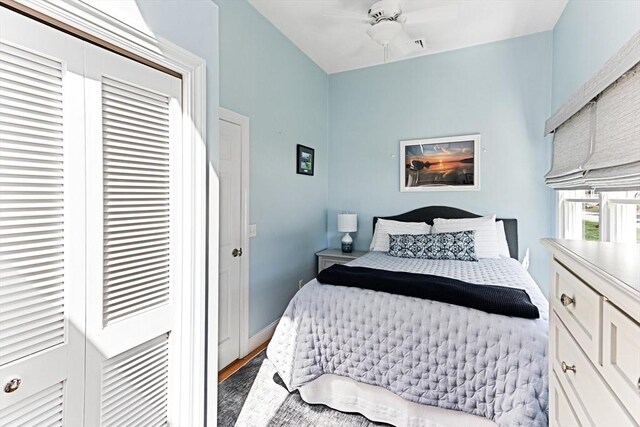 24 Park St, Bourne, MA 02559 - bedroom featuring a ceiling fan, a closet, and wood finished floors
