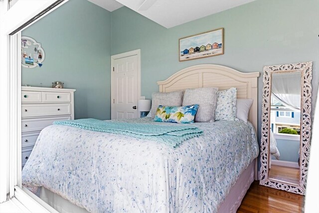 24 Park St, Bourne, MA 02559 - bedroom featuring vaulted ceiling and wood finished floors