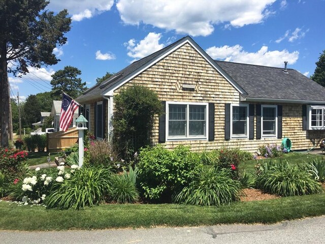 24 Park St, Bourne, MA 02559 - view of front of property featuring roof with shingles