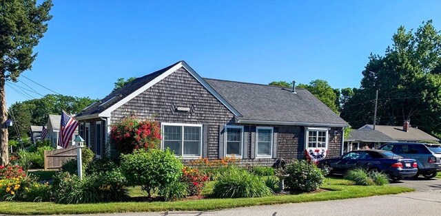 24 Park St, Bourne, MA 02559 - view of front of home featuring roof with shingles