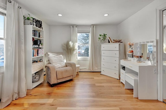 sitting room featuring light wood-type flooring