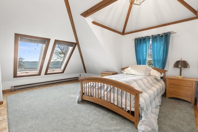 bedroom featuring a baseboard heating unit and high vaulted ceiling