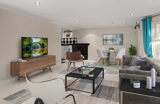 living room with ornamental molding