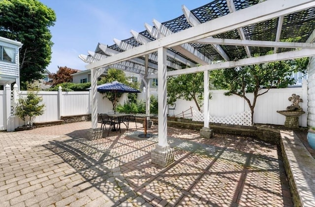 view of patio featuring a pergola