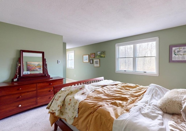 bedroom featuring light colored carpet