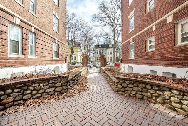 view of property exterior with a residential view