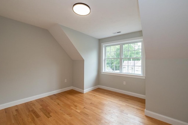 34 Torre St, Reading, MA 01867 - additional living space with light wood finished floors and lofted ceiling