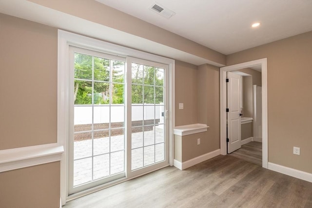 34 Torre St, Reading, MA 01867 - entryway with light wood-type flooring and recessed lighting