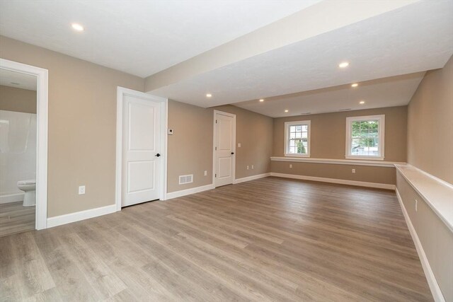 34 Torre St, Reading, MA 01867 - empty room featuring light wood-style flooring and recessed lighting