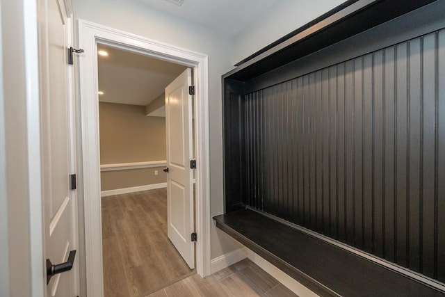 34 Torre St, Reading, MA 01867 - mudroom with light wood-style floors and baseboards