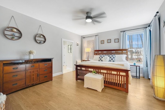 bedroom featuring ceiling fan and light wood-type flooring