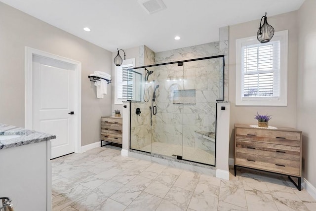 bathroom featuring vanity and walk in shower