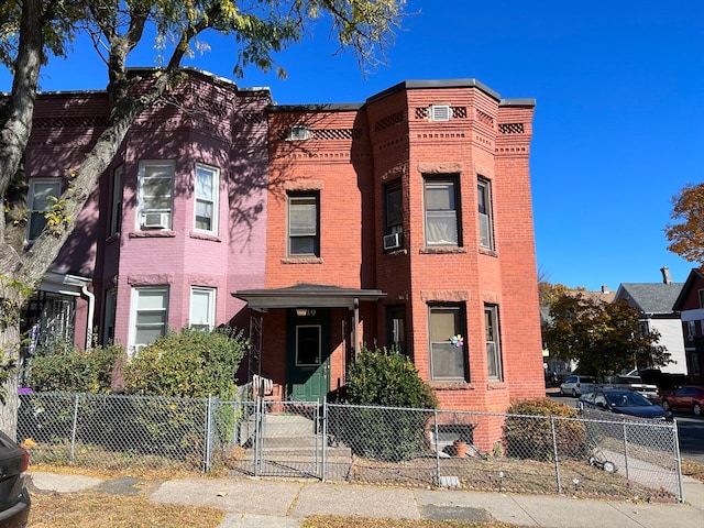 view of front facade featuring cooling unit