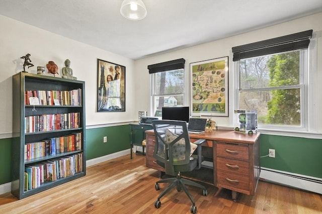 25 Cardigan Rd, Tewksbury, MA 01876 - office area with a baseboard heating unit, baseboards, and light wood-style flooring