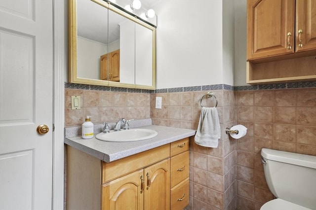 25 Cardigan Rd, Tewksbury, MA 01876 - half bath featuring vanity, toilet, and tile walls