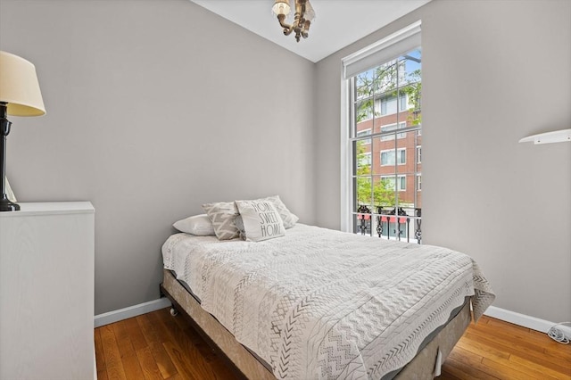 17 Bowdoin Unit 2B, Boston, MA 02114 - bedroom with baseboards, vaulted ceiling, and hardwood / wood-style flooring