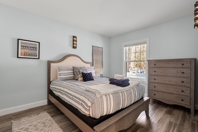 bedroom with wood-type flooring