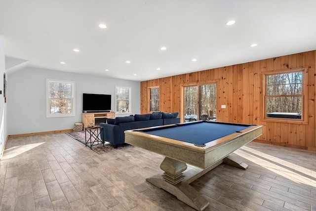 rec room featuring billiards, light hardwood / wood-style flooring, and a healthy amount of sunlight