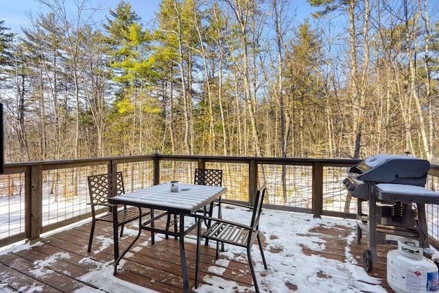 view of snow covered deck