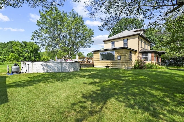 12 Boison St, Pittsfield, MA 01201 - view of green lawn with a deck and an outdoor pool