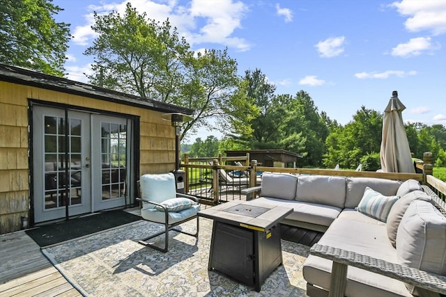 12 Boison St, Pittsfield, MA 01201 - wooden terrace with french doors, an outdoor living space with a fire pit, and a patio