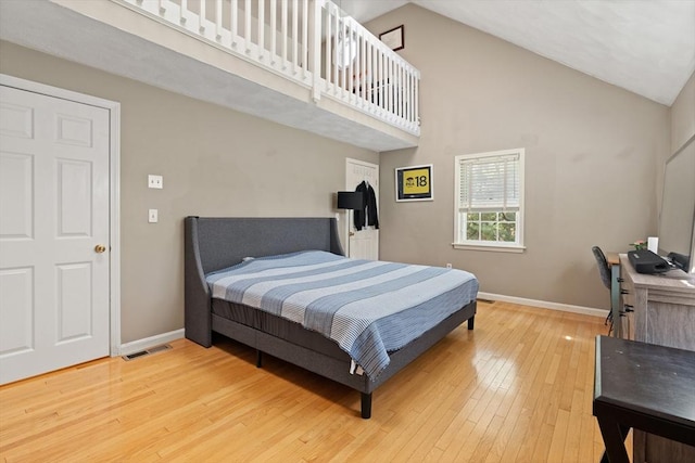 9 Michael Way Unit 41, Andover, MA 01810 - bedroom featuring hardwood / wood-style flooring, baseboards, high vaulted ceiling, and an office area
