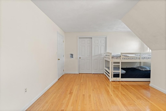 9 Michael Way Unit 41, Andover, MA 01810 - bedroom with hardwood / wood-style flooring, baseboards, and a closet