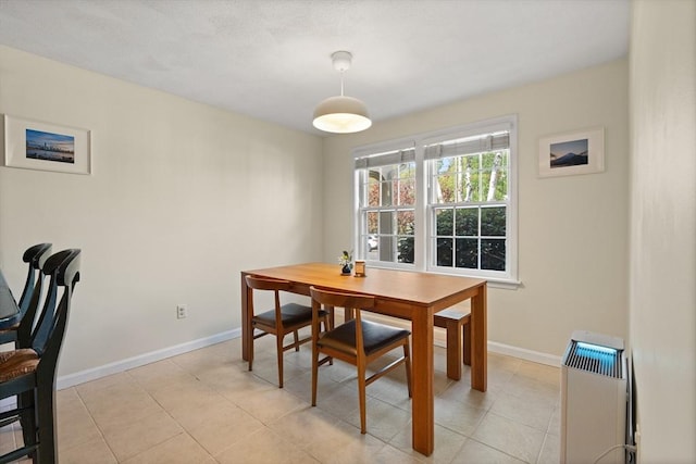 9 Michael Way Unit 41, Andover, MA 01810 - dining space with baseboards, heating unit, and light tile patterned floors