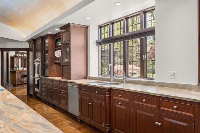 bar area with a sink, dark wood finished floors, plenty of natural light, recessed lighting, and lofted ceiling