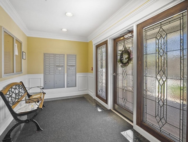 entrance foyer featuring ornamental molding, wainscoting, recessed lighting, mail area, and carpet flooring