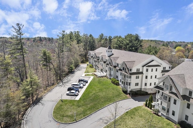 aerial view with a wooded view